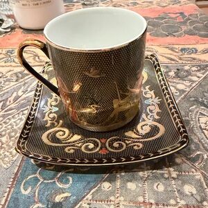 Elegant Black and Gold Tea Cup and Saucer Set